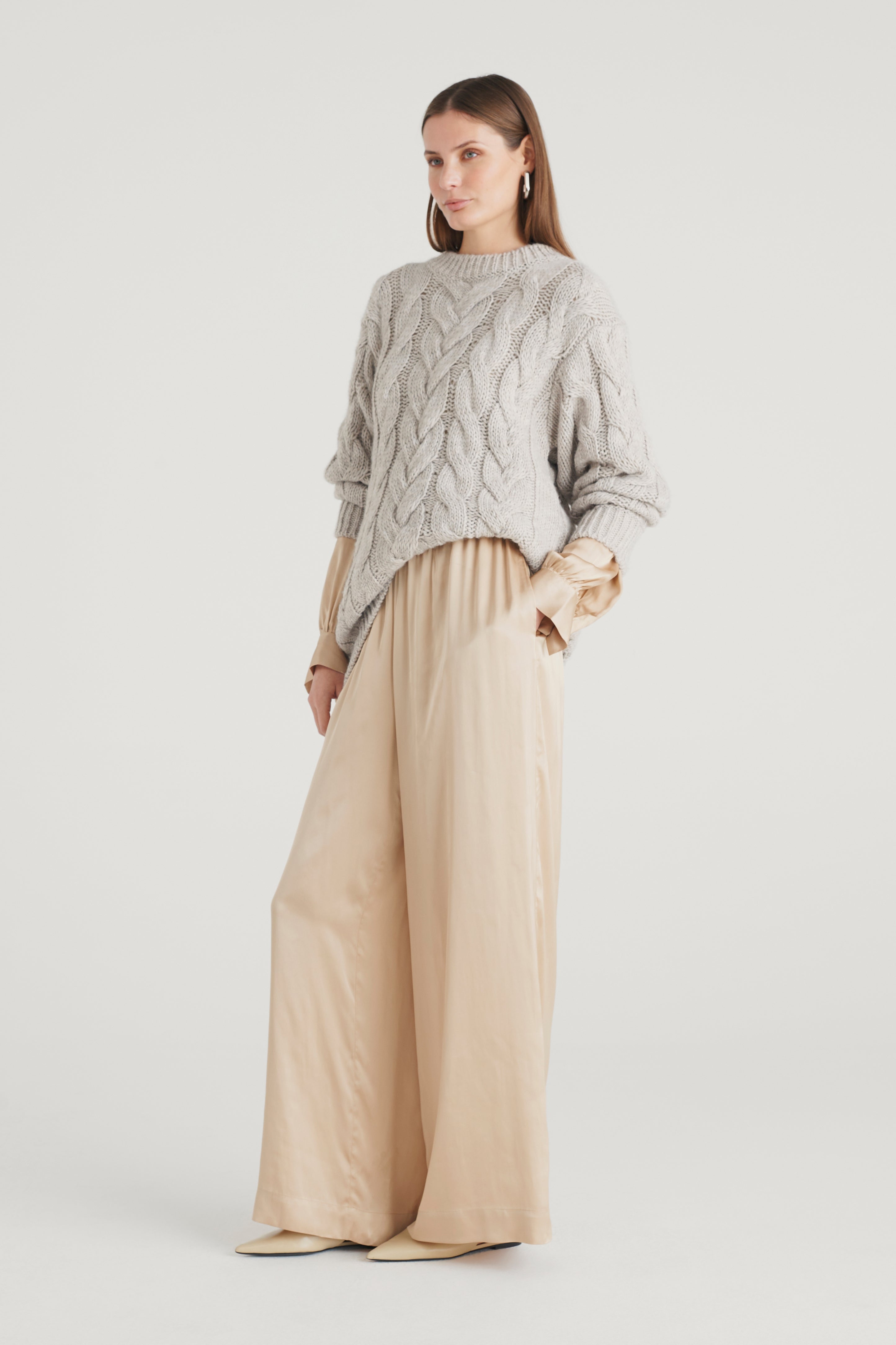 Maglia con punto treccia