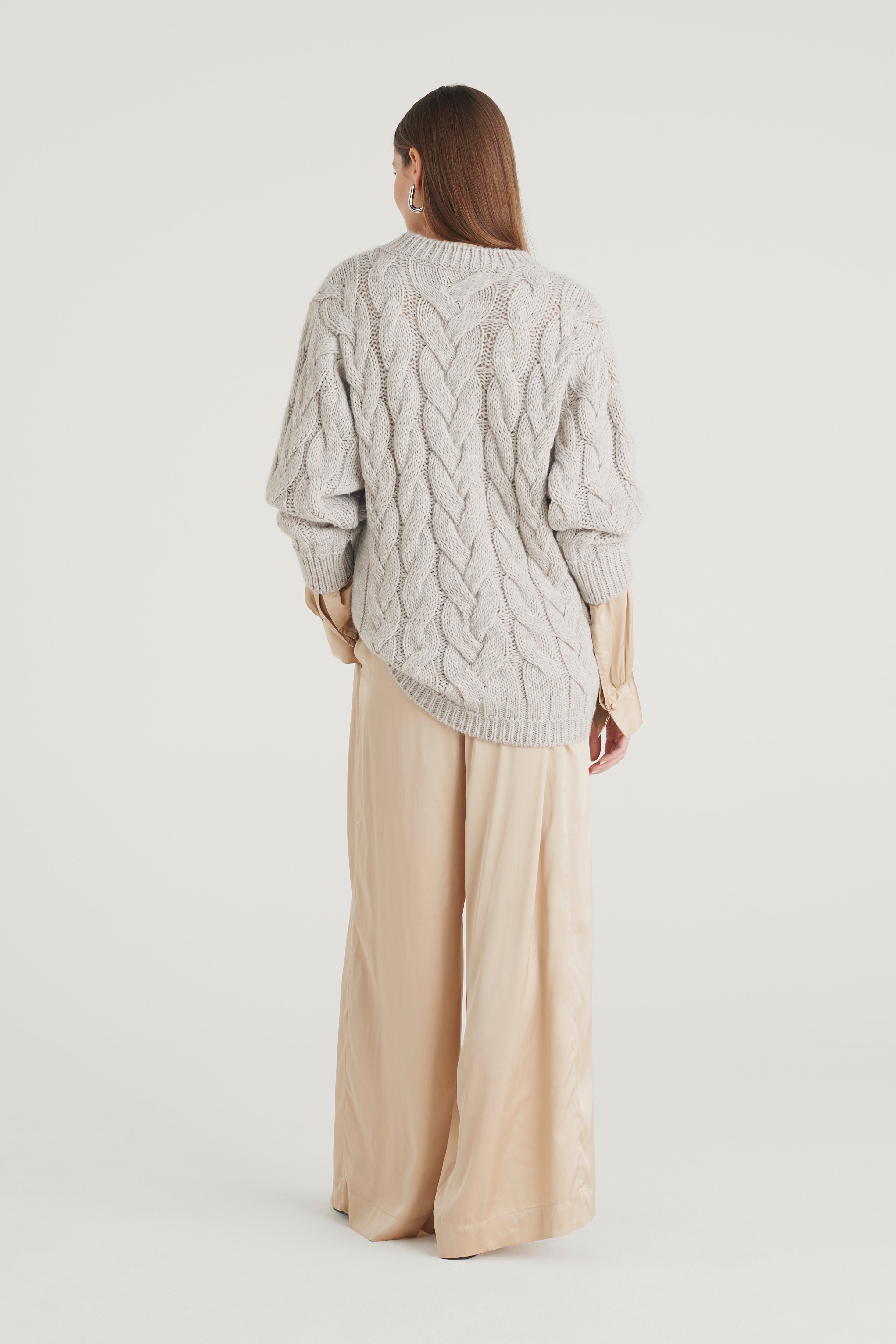 Maglia con punto treccia