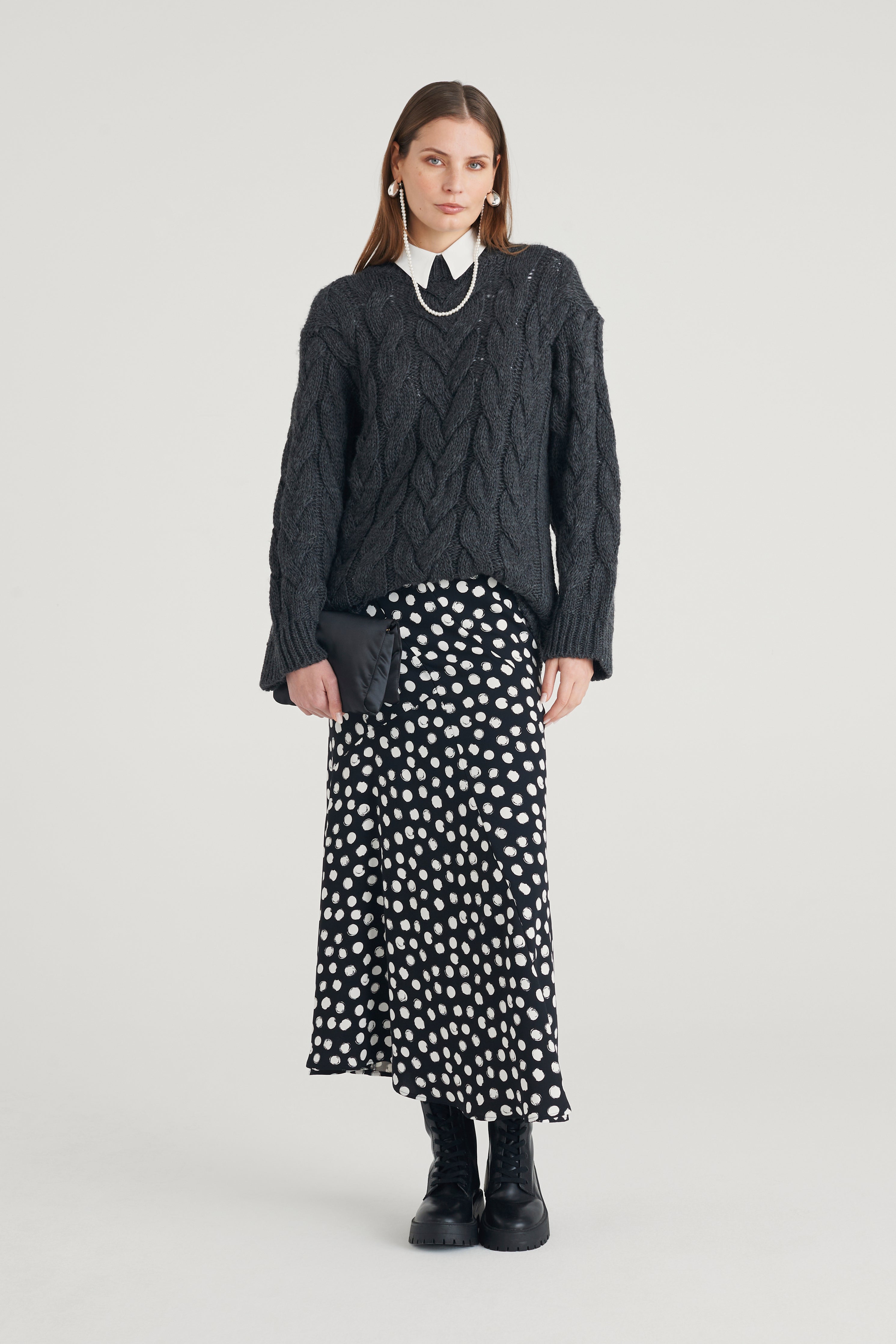 Maglia con punto treccia