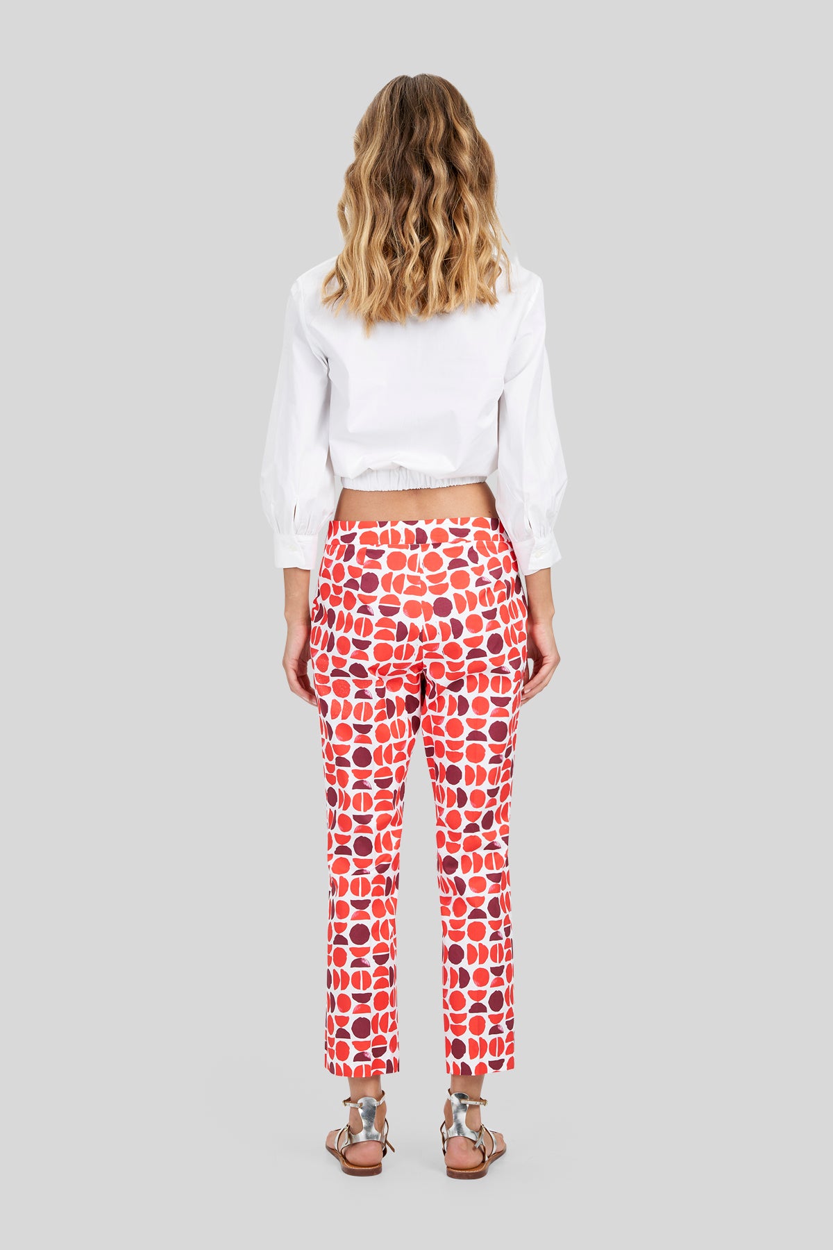 Pantaloni trumpet in gabardina a fantasia