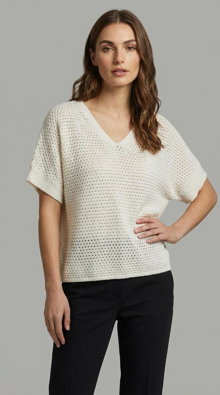 Maglia traforata con scollo a V