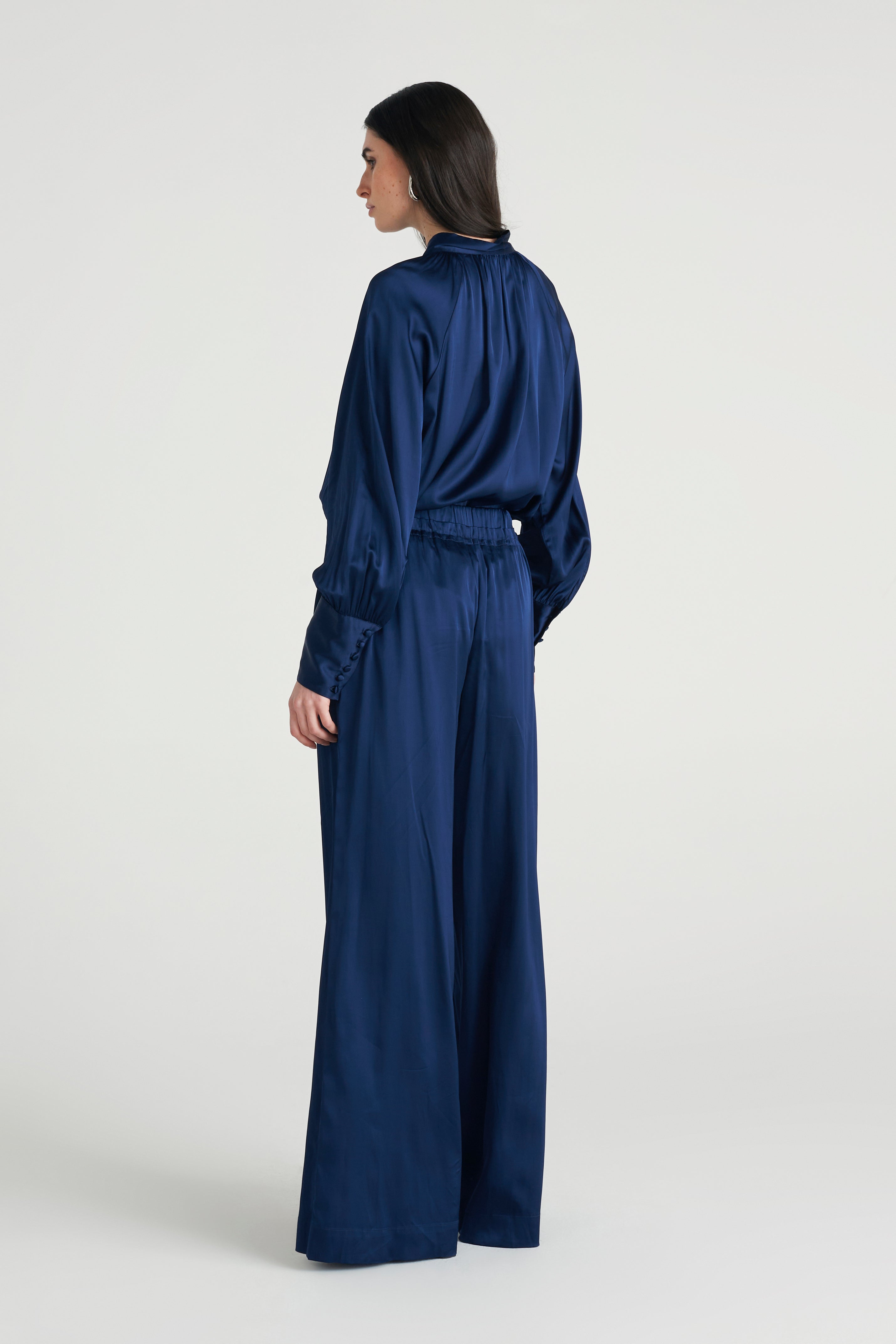 Pantalone fluido con pieghe