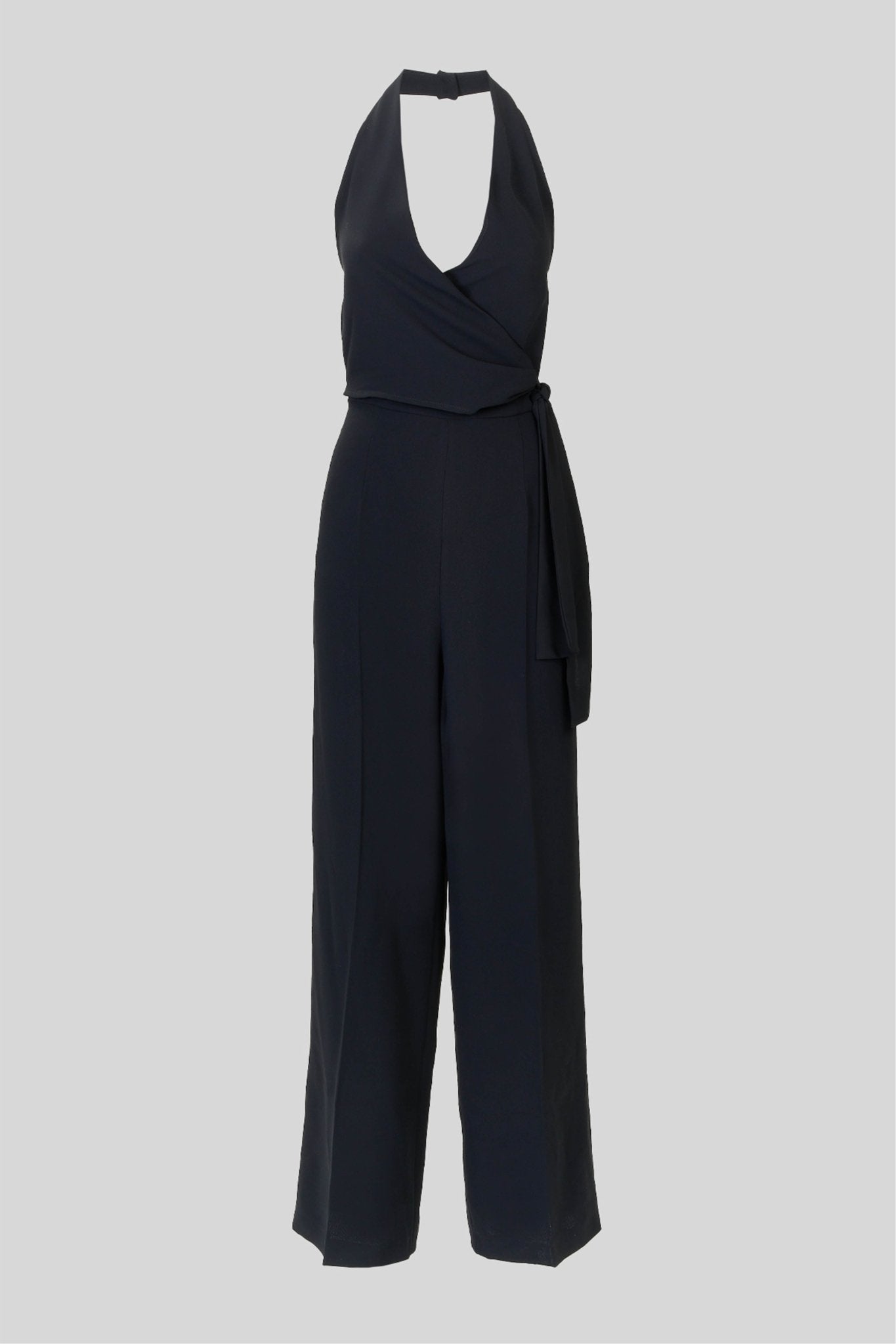 Tuta smanicata con fiocco laterale - Caractère